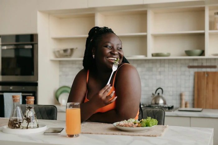 happy woman eating healthy
