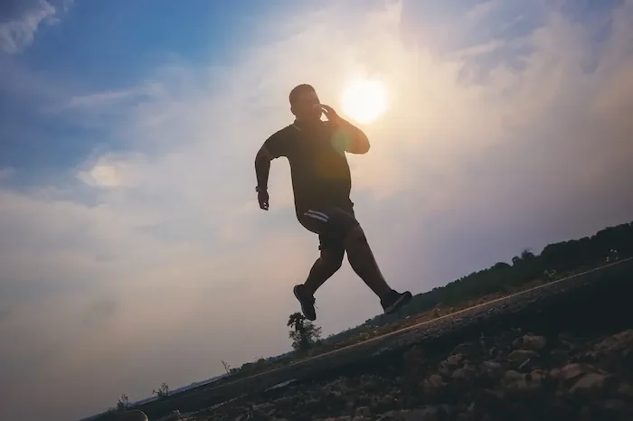 motivated man running after weight loss