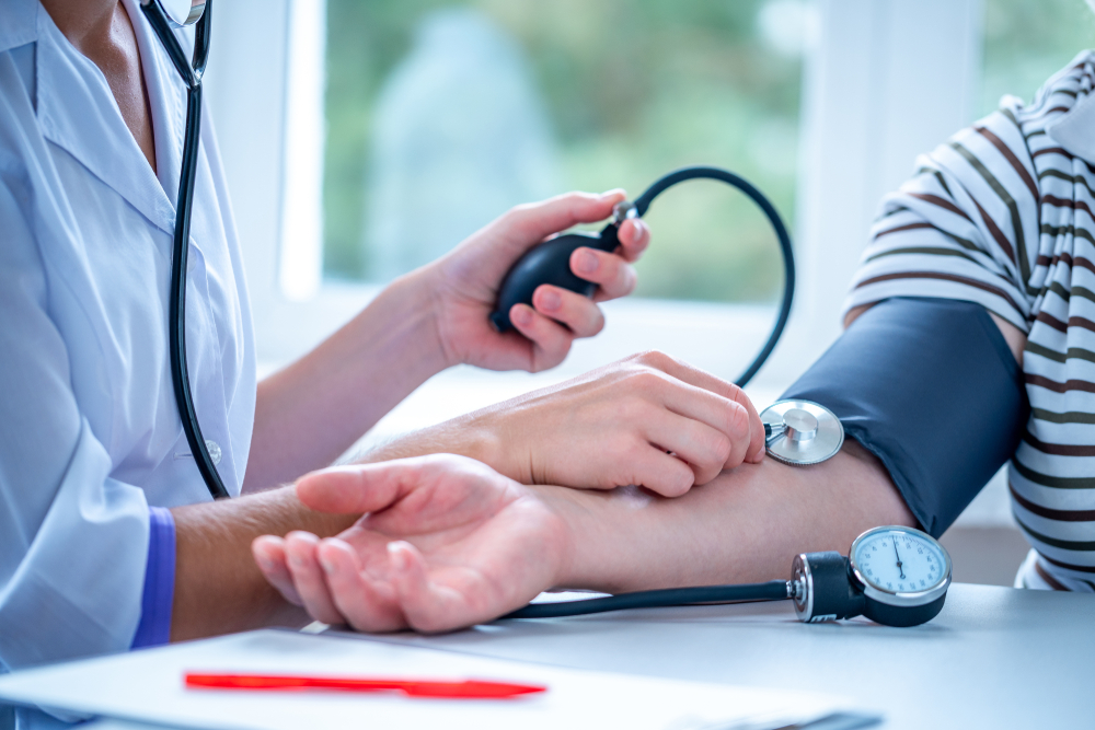 doctor taking blood pressure