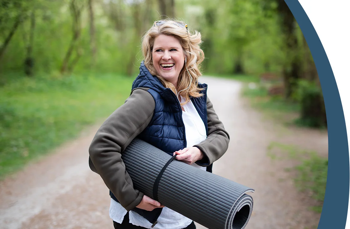 middle aged woman exercising outside