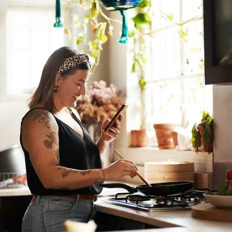 woman learning to cook a healthy recipe