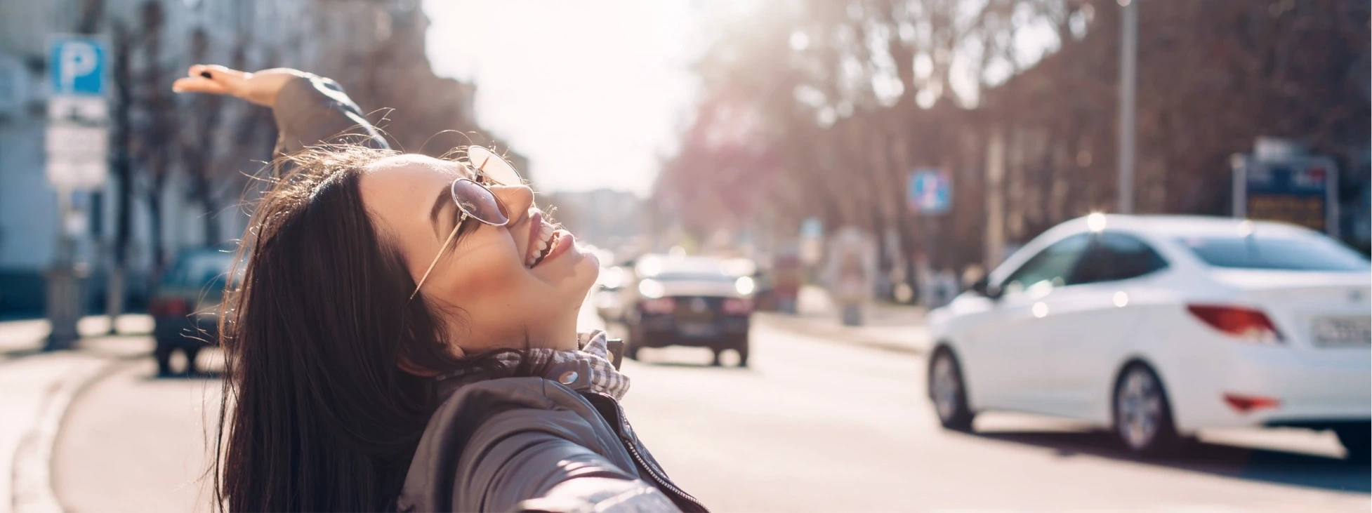 happy young woman in the city