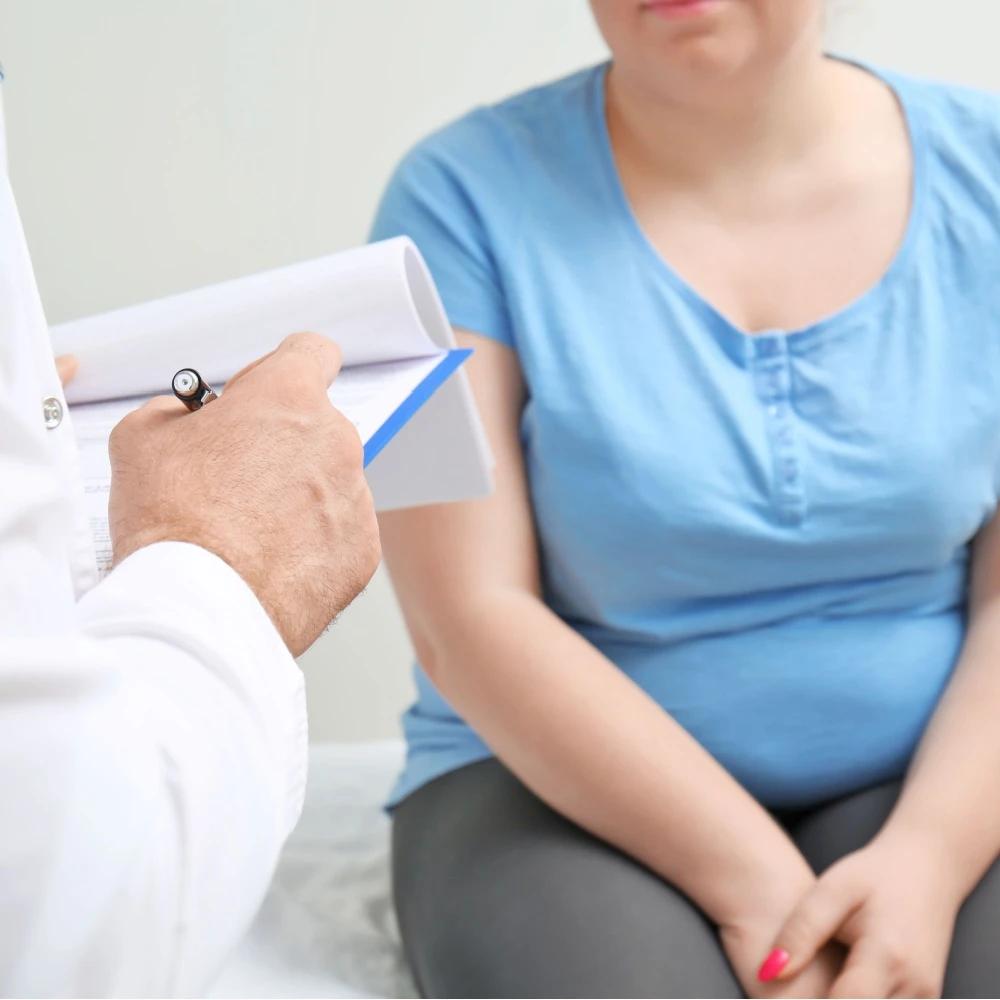 patient discussing revision options with doctor