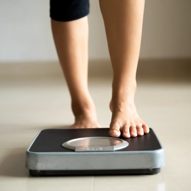 patient stepping on a scale